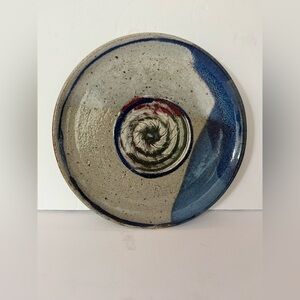 Artistic Rustic Ceramic Plate with Blue and Red Accents